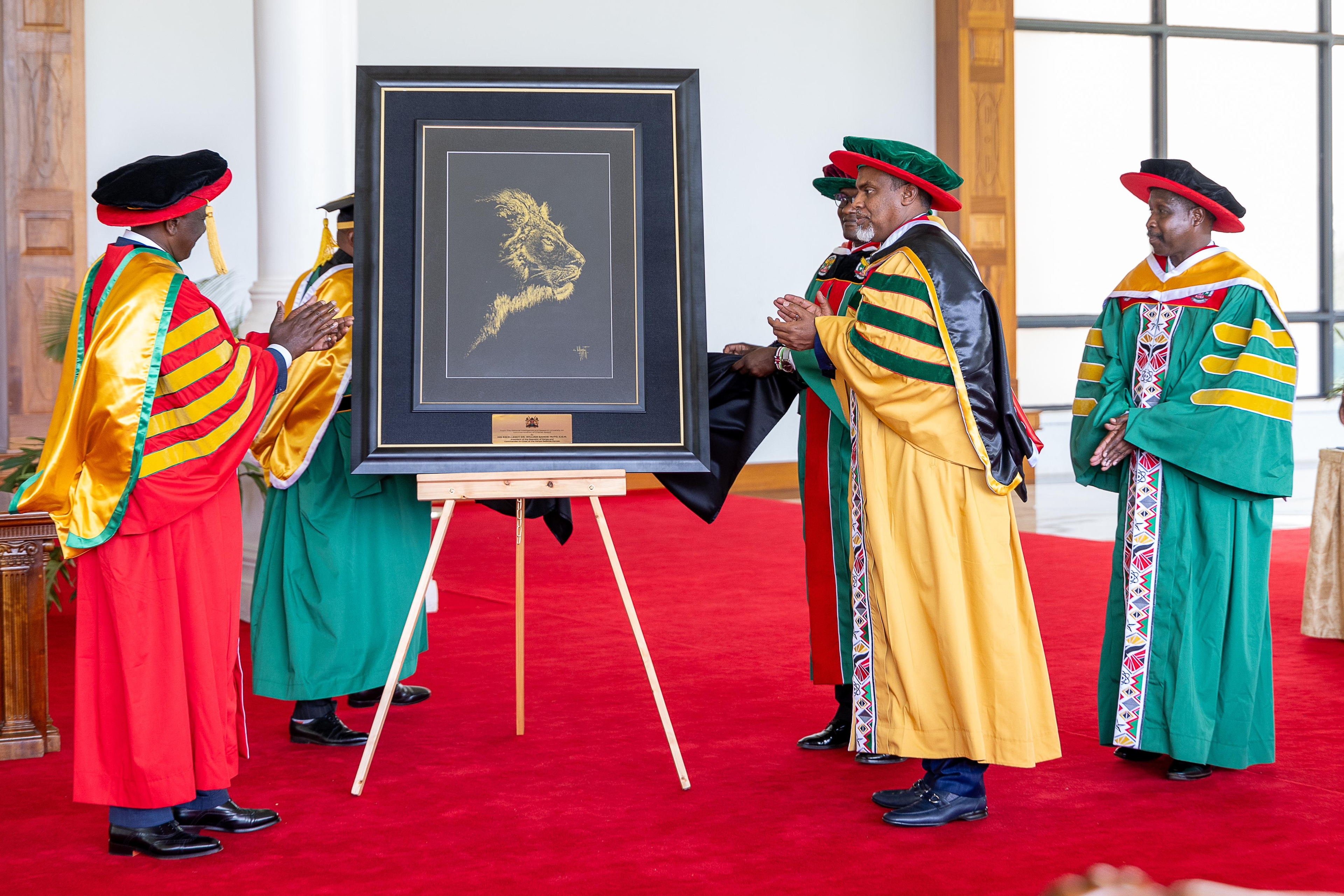 Ruto awards charter to National Intelligence University