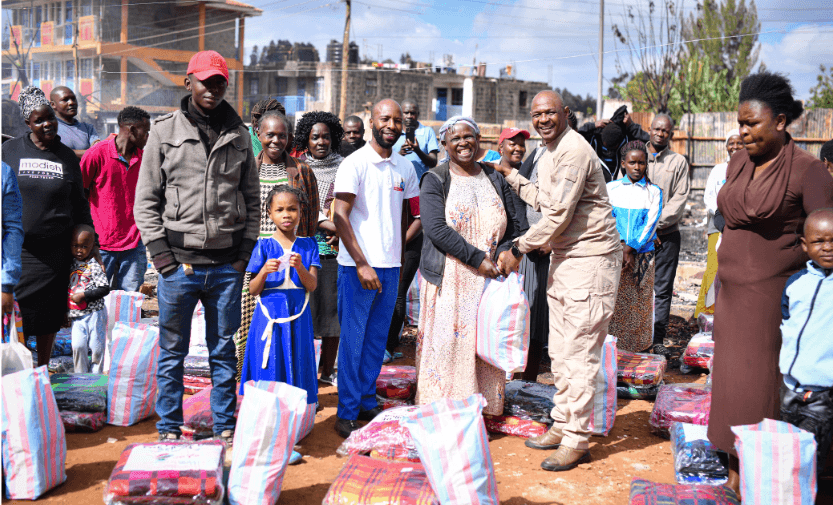 Victims of fire that razed 31 houses in Kangemi receive donations
