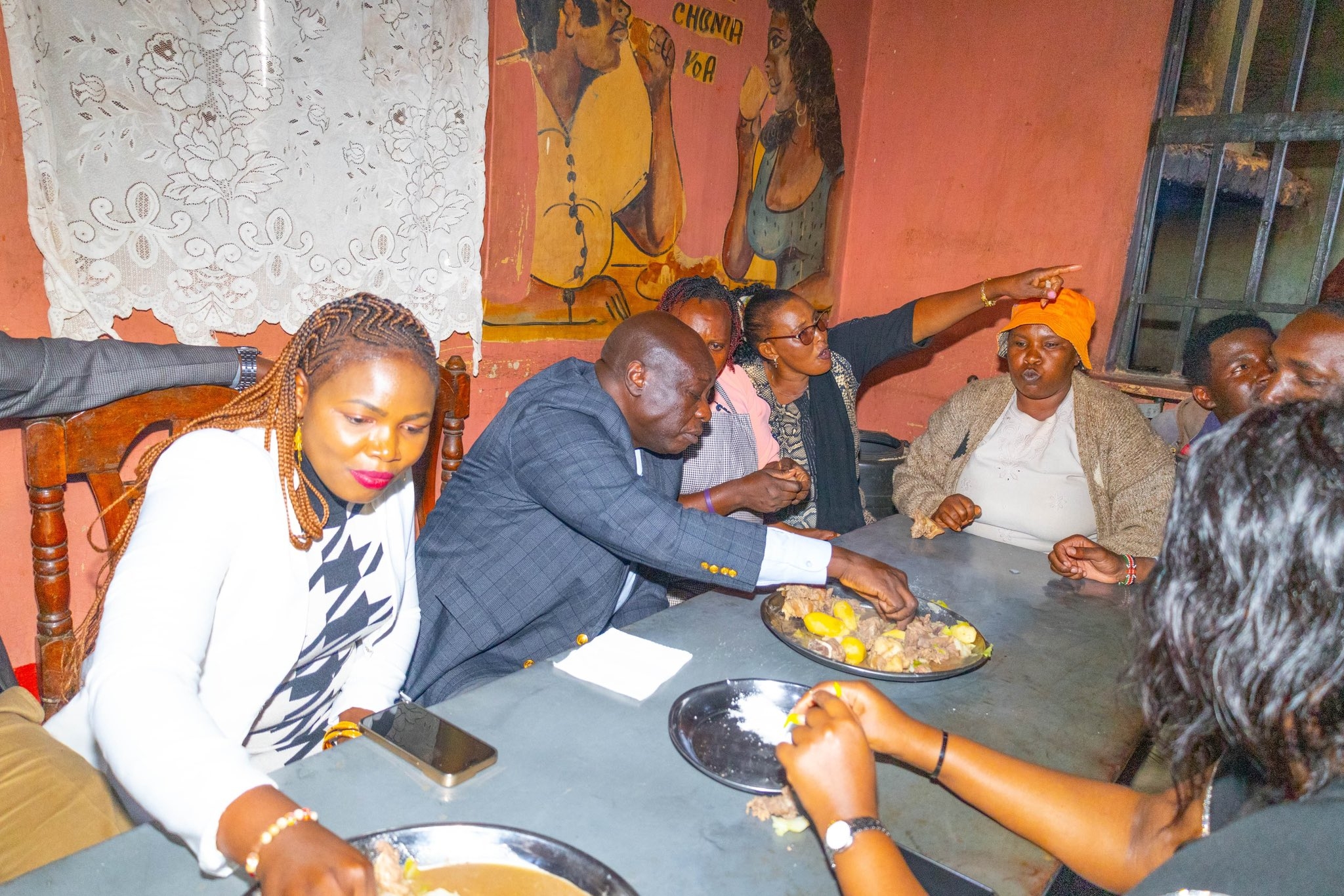 Gachagua enjoys meal with Murang'a residents after church