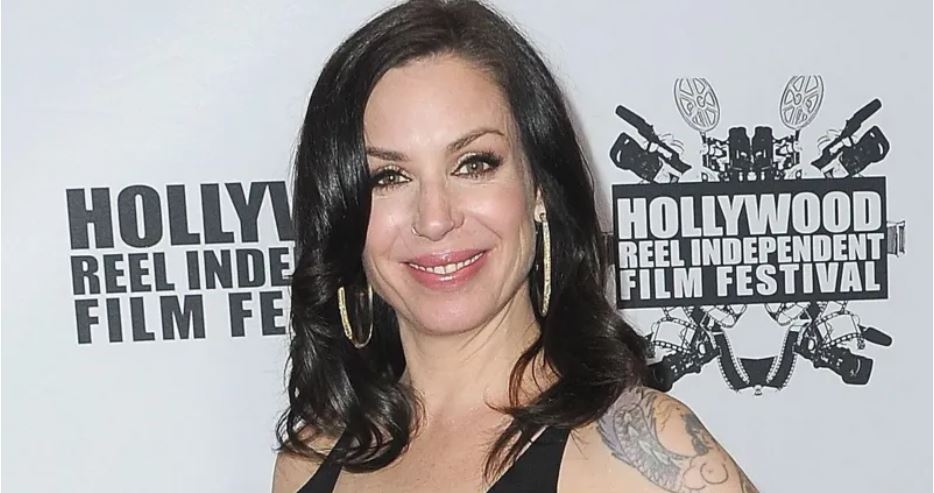 Author shot by police after backyard stand-off