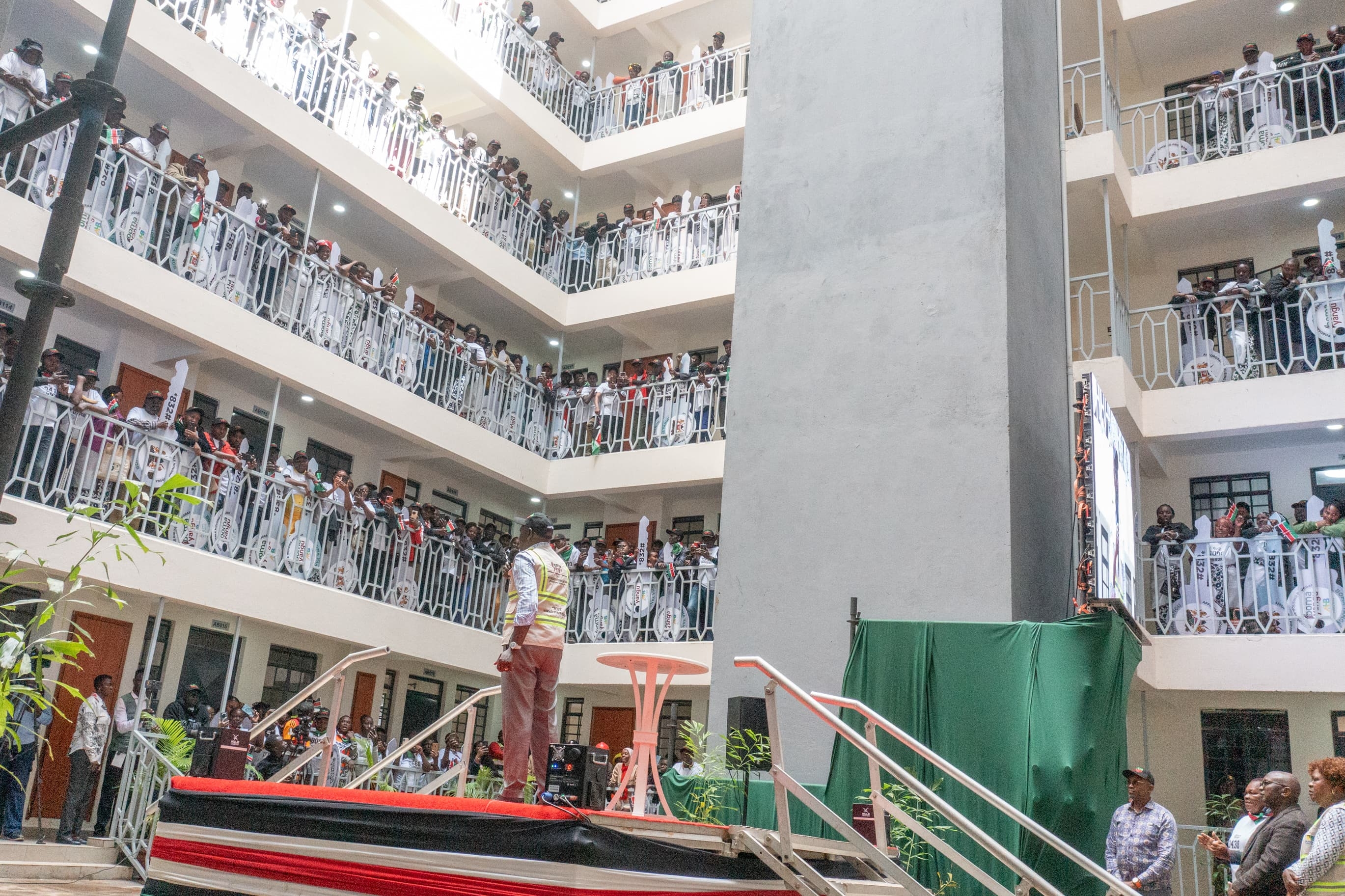 Ruto's prayer moment as he hands over keys for Mukuru housing