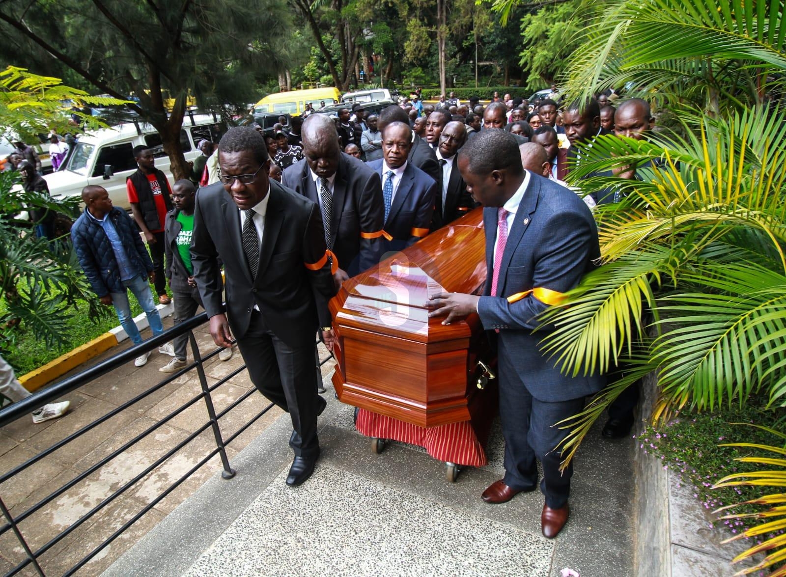 MP Were's body arrives for requiem mass