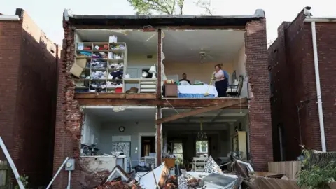 At least 25 dead after tornadoes sweep through US Midwest