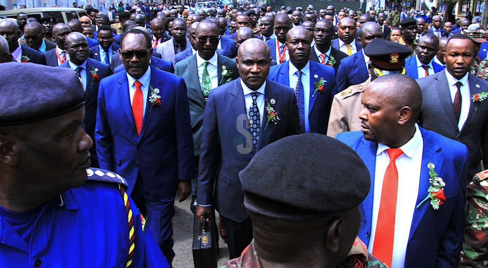 Mbadi marches to Parliament to present budget