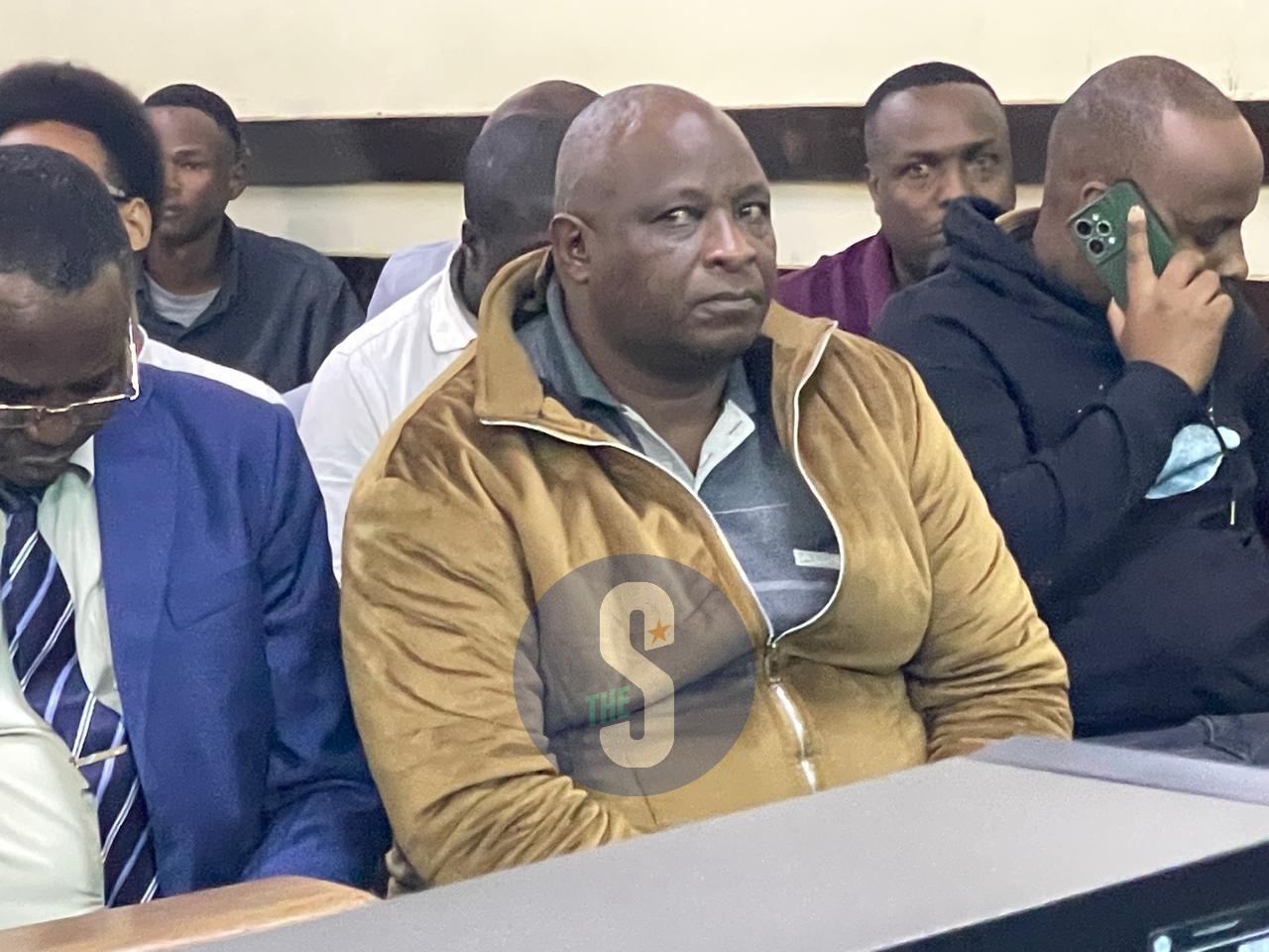OCS Talaam’s case stalls over his absence
