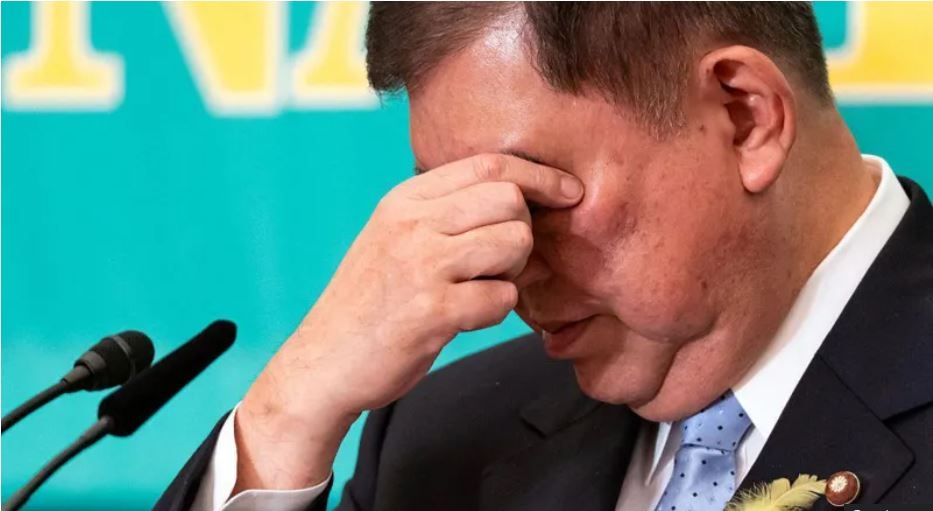 Japan's ruling party set to lose majority, exit polls suggest