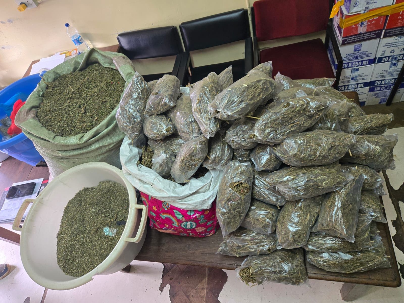 Two suspecs arrested as police seize bhang, illicit brew