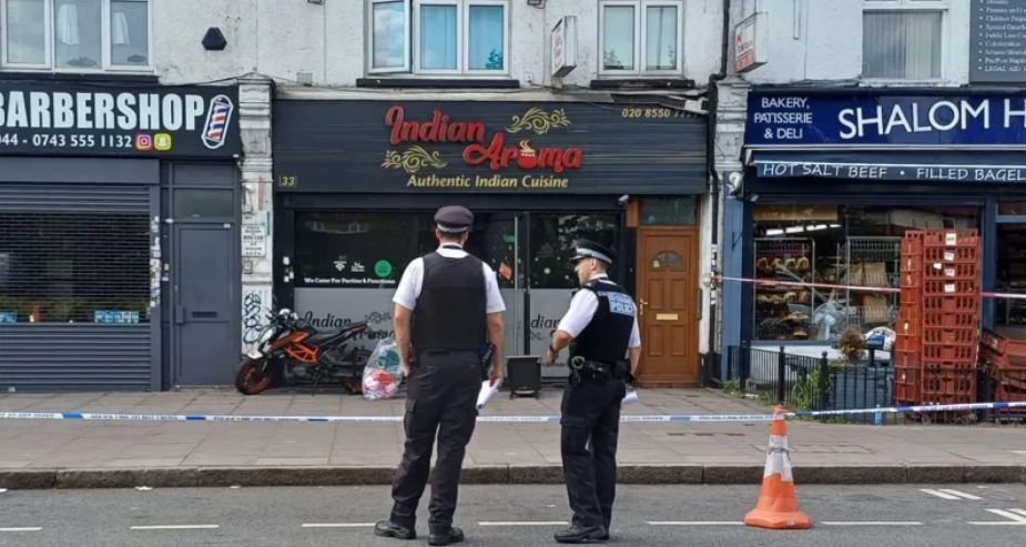 Boy and man held over restaurant 'arson attack'