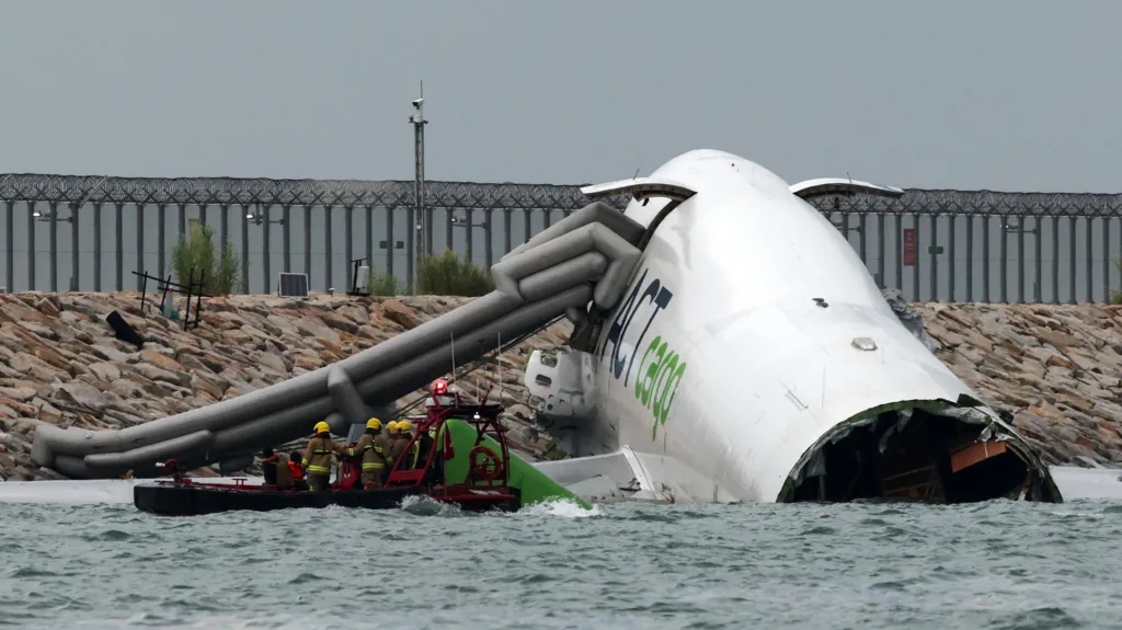 Two dead after cargo plane skids off Hong Kong runway into sea
