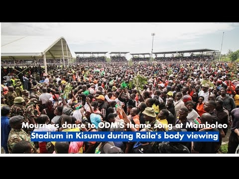 Mourners dance to ODM'S theme song at Mamboleo Stadium in Kisumu during Raila's body viewing