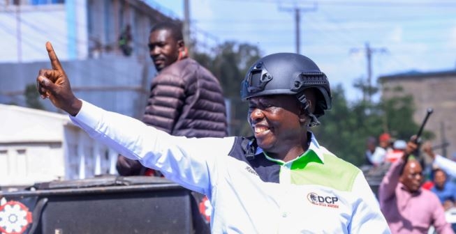 Ex-DP's military-style helmet steals show in Narok
