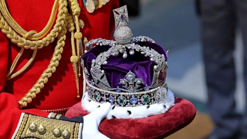 Four arrested after Tower of London display case containing State Crown defaced