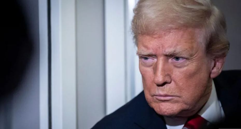 Trump releases fraudster executive days into prison sentence